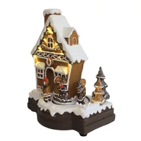 Játszó és mozgó mézeskalács házikó LED-del (23 cm)